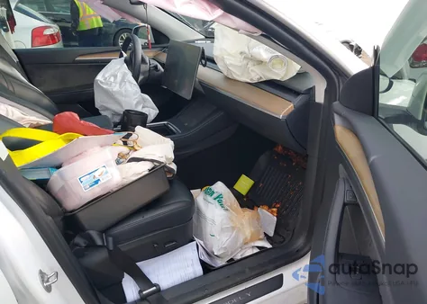 2023 Tesla Model Y Awd/Long Range Dual Motor All-Wheel Drive from USA, damaged, VIN 7SAYGDEE6PA033834